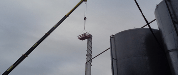 Engineer in Lift Installing a Lightning Conductor