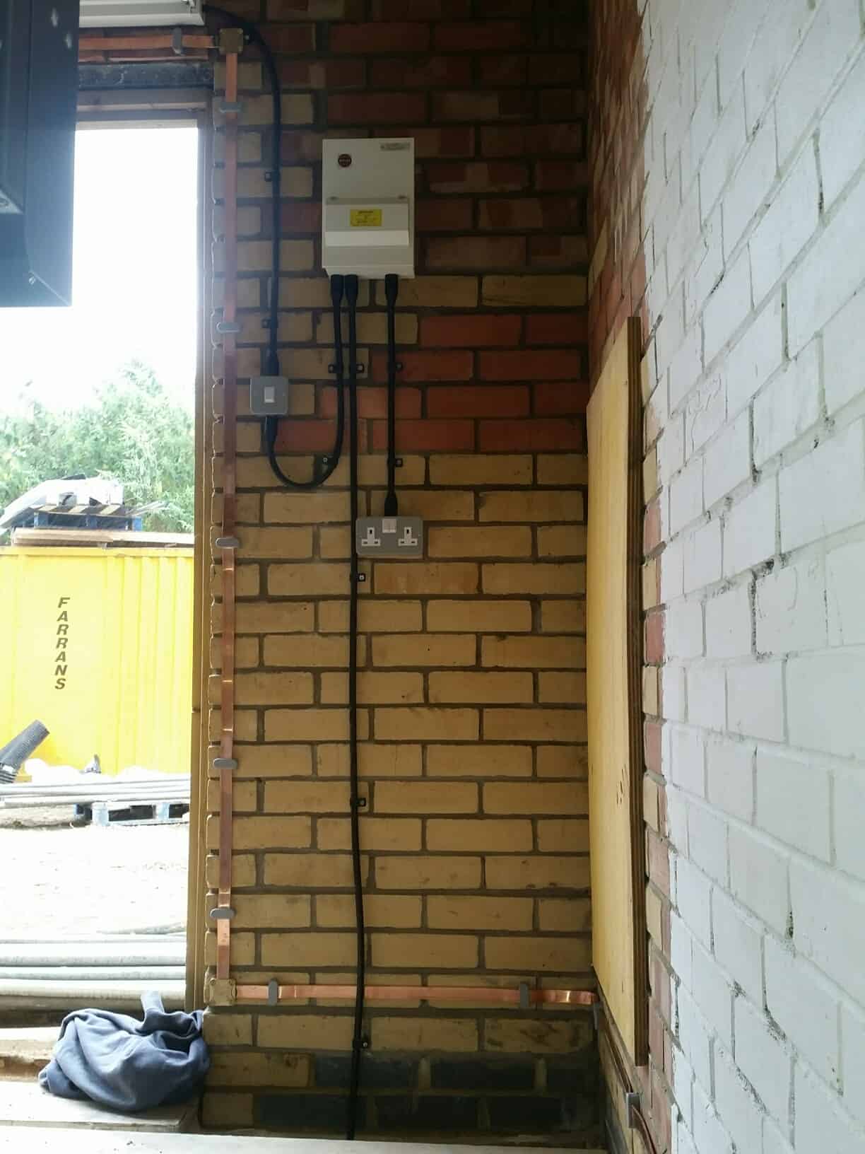 Earthing System Attached to Wall with Electrics